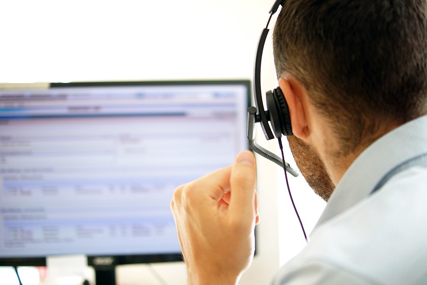 man on computer