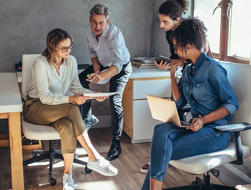 four people in discussion